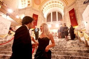 Nicko Fusso, 24, and Corrine Oberg, 23, talk on the steps of the rotunda during the Governor's Inaugural Ball on Wednesday night in Olympia. The event concluded a day of inauguration events for Gov. Chris Gregoire. 