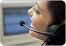 a woman in a call center talking on the phone