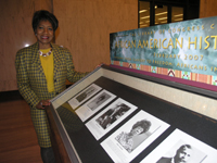 Rep. Juanita Millender-McDonald visits the Library's African American History Month display in the main lobby of the Madison Building. The display featured items from the Library's vast collections of African-American history and culture.