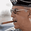 Army Lt. Gen. Russ Honore, with his ubiquitous cigar, pay...