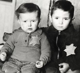 Five-year-old Avram and two-year-old Emanuel Rosenthal, photographed in the Kovno ghetto shortly before they were rounded up in the March 1944 - Children's Action.