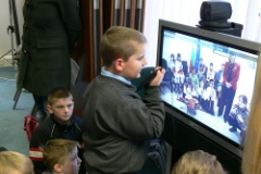 One of the Irish children puts a question to the Bulgarian school class