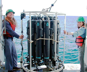 Scientists collecting critical oceanographic data to better understand harmful algal blooms. How and why harmful algal blooms (HABs) occur are complex issues.  ECOHAB PNW is a 5-year multi-disciplinary project that studies the physiology, toxicology, ecology, and oceanography of toxic Pseudo-nitzchia species off the Pacific Northwest coast.  As part of NOAA’s OHH initiative, scientists will build off of and complement ECOHAB efforts to better understand the role of climate variability on the incidence of HABs, improve understanding of community dynamics that lead to HABs, and develop an accurate early warning capability.