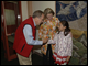 Secretary Spellings and Senator Ted Stevens are greeted by a student at Nome Elementary School in Nome, Alaska.