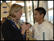 Secretary Spellings speaks with a member of the King Island Dancers at Nome Beltz Junior/Senior High School in Nome, Alaska.