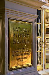 Brass plaque at the Museum's front door reads: Natural History Museum, San Diego Society of Natural History, Incorporated 1874.