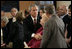 President George W. Bush talks with John and Jane Vigiano after the Service of Prayer and Remembrance at St. Paul’s Chapel near Ground Zero in New York City Sunday, September 10, 2006. The Vigiano family lost two sons, a police detective and a firefighter, in the terrorist attacks of September 11, 2001.