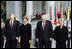 President Bush stands with Laura Bush, Vice President Dick Cheney and Mrs. Cheney as they observe a moment of silence, on the South Lawn, in honor of 9/11 victims September 11, 2005. This marks the fourth anniversary of terrorist attacks on both the World Trade Center and The Pentagon.