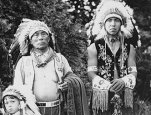 Tulalip family in ceremonial dress pose in Volunteer Park, Seattle, Washington, 1938