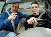 image of teen driver and father