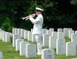 Navy bugler sounds Taps at military funeral