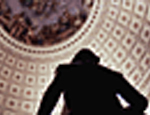 Image of a person looking up at the Capitol dome.