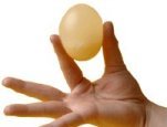 A naked egg is an egg without a shell. Using vinegar, you can dissolve the eggshell -- without breaking the membrane that contains the egg.