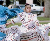 Graciela Santiago performs at the Mexican Fiesta in Finney County