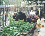 Women and children at the Toc-H community garden, East London