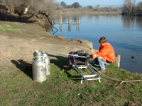 The analysis of pesticides sometimes requires large-volume water samples to detect pesticides that are toxic at low concentrations. This is a view of a pump used to collect samples from the San Joaquin River near Vernalis, CA (circa 2000). The sampling effort was part of a project to study pesticides and other anthropogenic chemicals in the San Francisco Bay/Delta