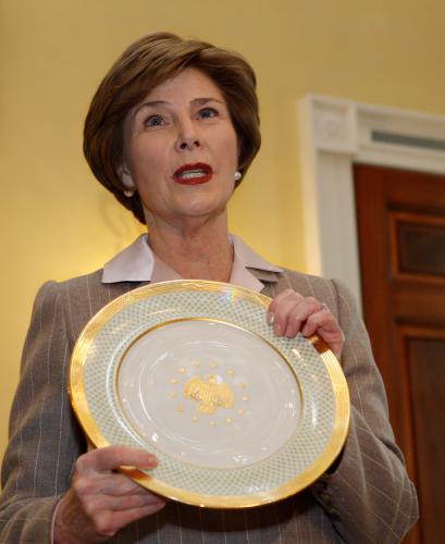 Laura Bush is leaving behind a 320-place setting of china for the Obamas.