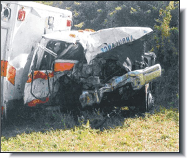 Photo of wrecked ambulance—links to Fatality investigation report