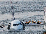 Passengers in an inflatable raft move away from an Airbus 320 US Airways aircraft that has gone down in the Hudson River in New York, Thursday Jan. 15, 2009.
(AP)