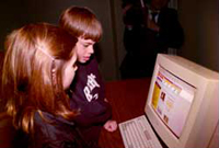 Children attending the introduction of the new "America's Story from America's Library" Web site wasted no time "logging on, playing around, and learning something" on Internet workstations set up for their use following the program.