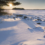 Sunset over a frozen lake