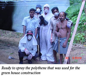 Uromi Goodale, Ready to spray the polythene that was used for the green house construction