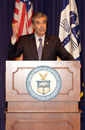 Secretary Carlos Gutierrez at podium