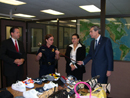 Commerce Secretary Carlos M. Gutierrez listens as officials involved with Intellectual Property Rights (IPR) law enforcement discuss seizures of counterfeit goods coming into the U.S. 