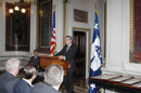Secretary Carlos M. Gutierrez speaks with E-Award receipents at the EEOB