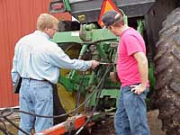 [Image: Inspection of a tractor]