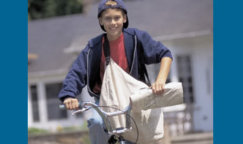 Teen worker paperboy