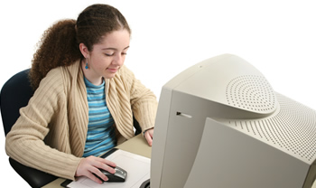 Teen worker on computer