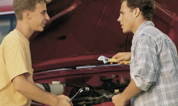 Teen workers auto mechanics