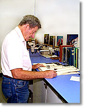 Reid Moran, Curator Emeritus, in herbarium inspecting Dudleyas, photo by dclark