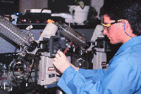 Researcher performing chemical analysis