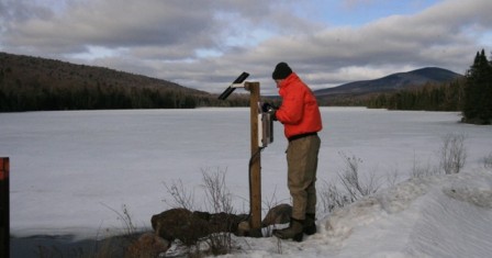 servicing a datalogger in the Adirondack Mts.
