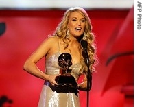 Carrie Underwood accepts Grammy award for Best Female Country Vocal Performance, 11, Feb. 2007