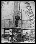 Captain on the bridge of a ship