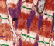 Wide Red, narrow white and thin green diagonal stratiation on the cells
