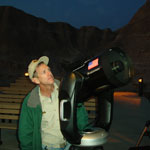 Night sky volunteer using the park's telescope