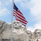 American flag flying at Mount Rushmore National Memorial