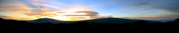 Spectacular sunrise overlooking Mauna Kea and Mauna Loa volcanoes.