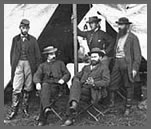 Seated: R. William Moore and Allan Pinkerton. Standing: George H. Bangs, John C. Babcock, and Augustus K. Littlefield