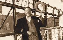 A world traveler, the dapper Julian founded Black Eagle Airline in 1946 to ferry goods between North and South America. 