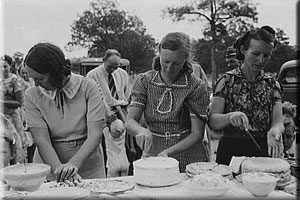 image of women cutting cakes in Pie Town, New Mexico