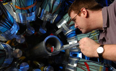Visiting research associate Chris Campbell works in the S3 vault at the National Superconducting Cyclotron Laboratory.