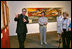 Mrs. Laura Bush and her mother, Jenna Welch, far right, are guided by Mr. Alfonso Miranda Márquez, far left, and Ms. Pilar O'Leary, center, on a tour of the exhibit, "Myths, Mortals, and Immortals: Works from Museo Soumaya de Mexico," at the Smithsonian International Gallery in Washington, D.C., Friday, Sept. 15, 2006. September 15 marks the first day of Hispanic Heritage Month.