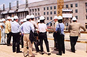 ACHP members view from an observation deck the area of the Pentagon damaged during the September 11, 2001, terrorist attacks on the U.S.
