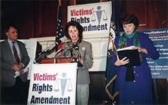 Roberta Roper speaks at a press conference for the Federal Crime Victims' Rights Amendment along with Sponsors Sen. Jon Kyl (R-AZ) and Sen. Diane Feinstein (D-CA)