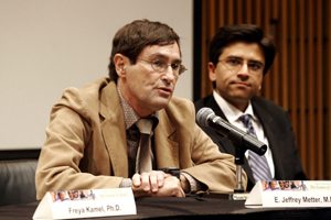 Shown during the roundtable session, physician-scientist Metter discussed findings of the Baltimore Longitudinal Study of Aging as NIA colleague Patel watched.